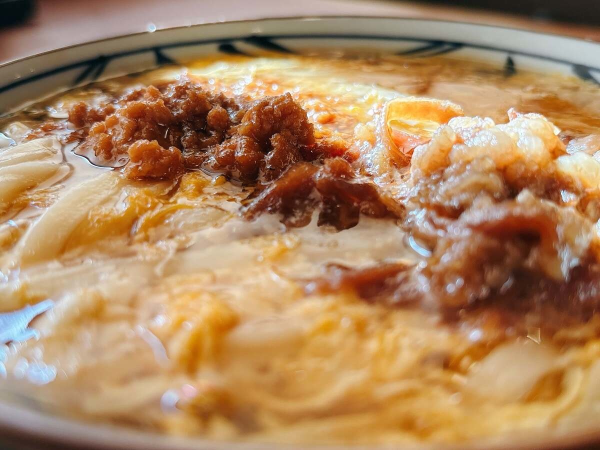 丸亀製麺「肉がさね玉子あんかけ 並(税込840円)」