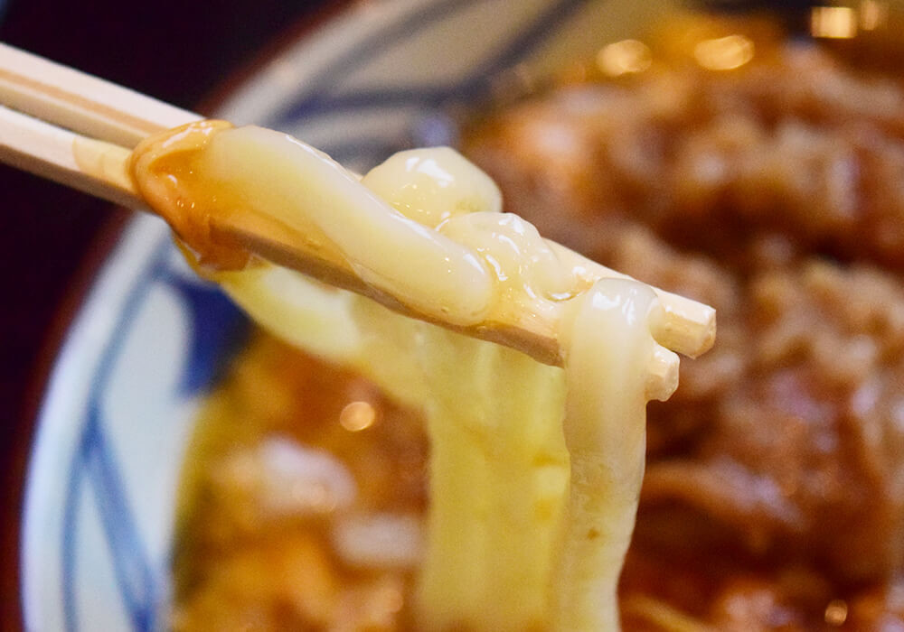 丸亀製麺「肉がさね玉子あんかけうどん」