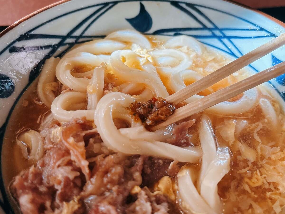 丸亀製麺「肉がさね玉子あんかけ 並(税込840円)」